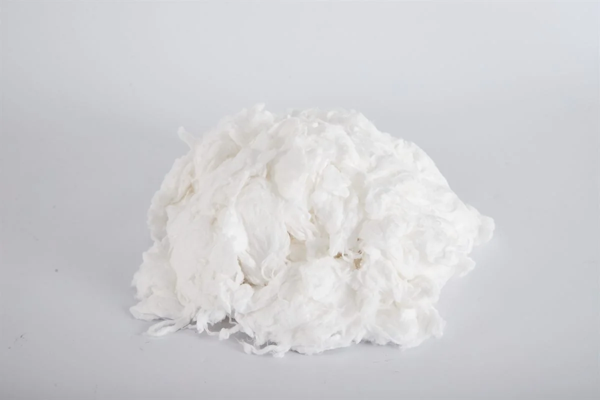 Bleached absorbent cotton material