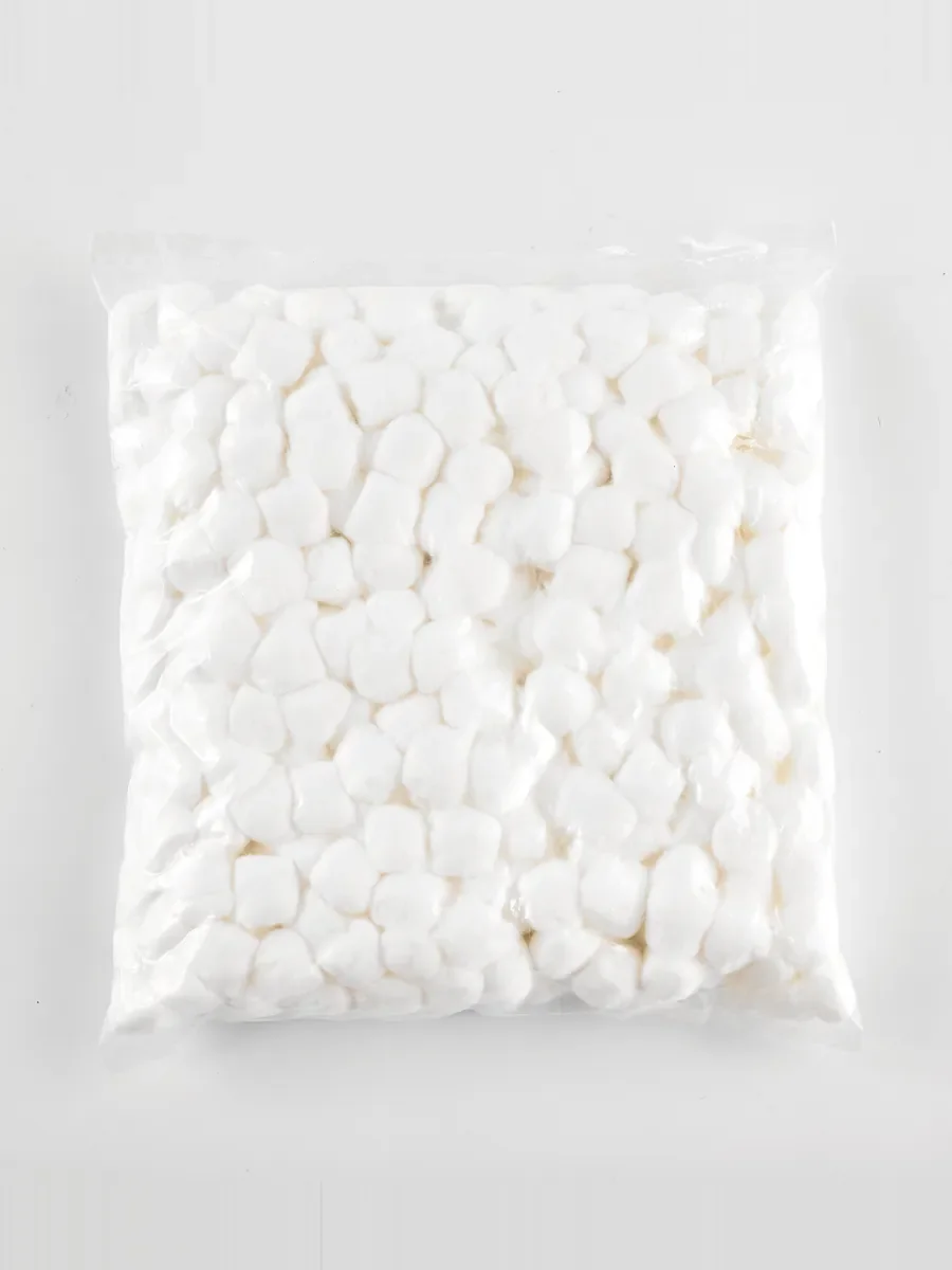 White cotton balls in a clear sealed plastic bag