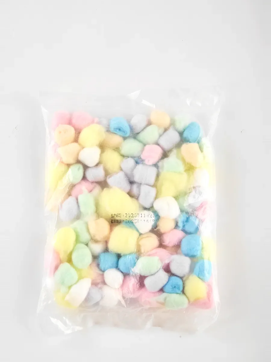Pastel colored cotton balls in a clear bag