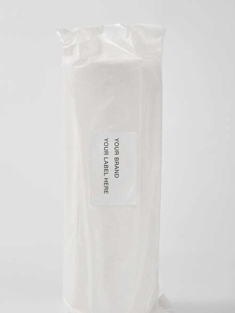 Absorbent cotton roll in a clear plastic bag with a placeholder sticker label