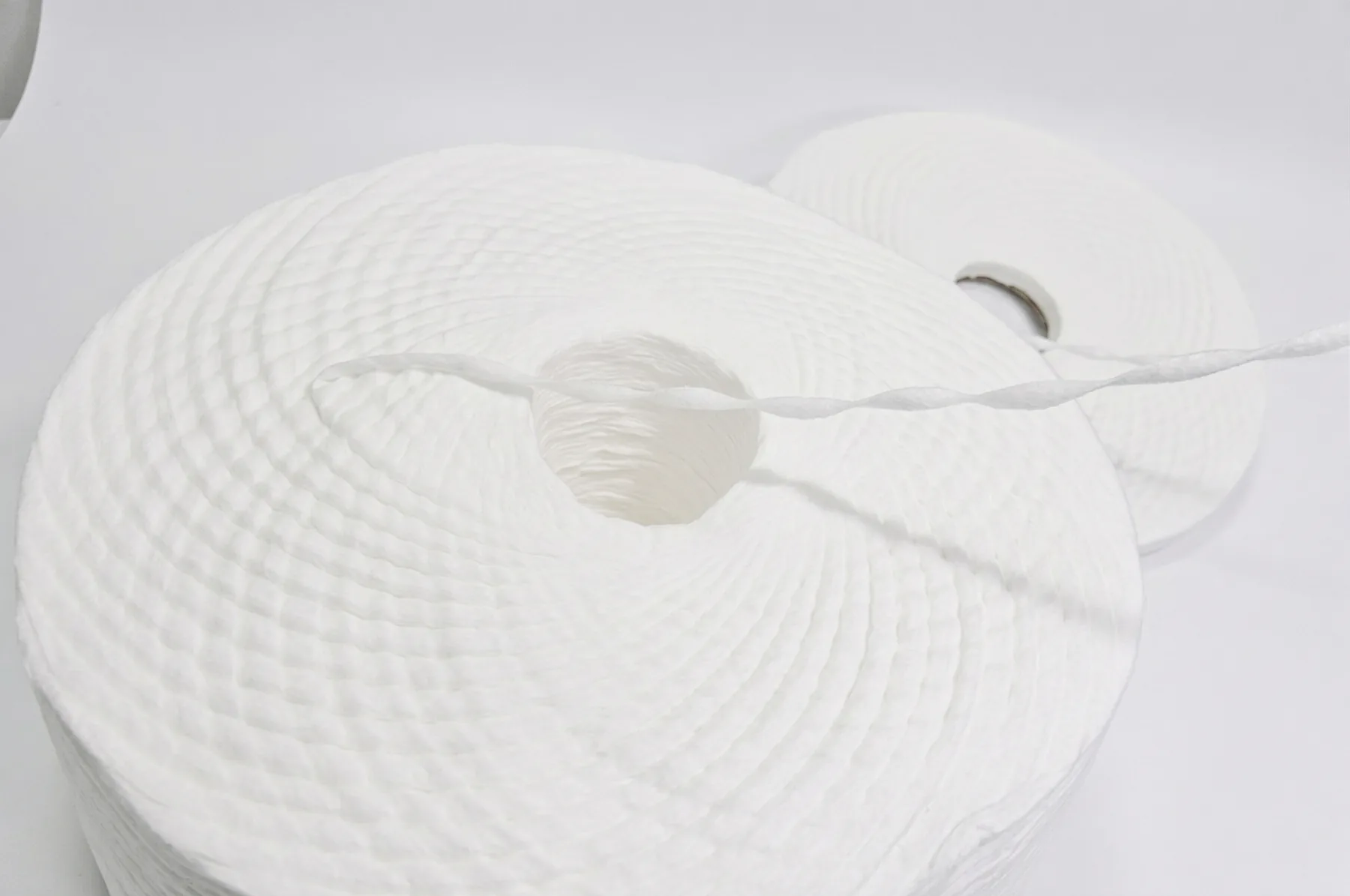 Finished cotton sliver wound into large coils